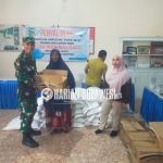 Babinsa Dampingi Penyaluran Bantuan Pangan untuk 133 KK di Desa Pombolowo