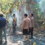 TNI–Polri–Warga Bersatu Padamkan Kebakaran Lahan di Lambunu Utara, Parimo