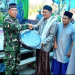 Kodim 1307/Poso Salurkan Bantuan Rebana dan Sembako Saat Maulid di Pedalaman Wana