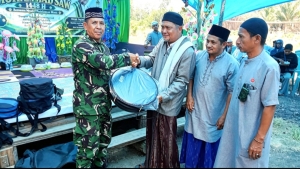 Kodim 1307/Poso Salurkan Bantuan Rebana dan Sembako Saat Maulid di Pedalaman Wana
